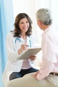 Doctor speaking with patient